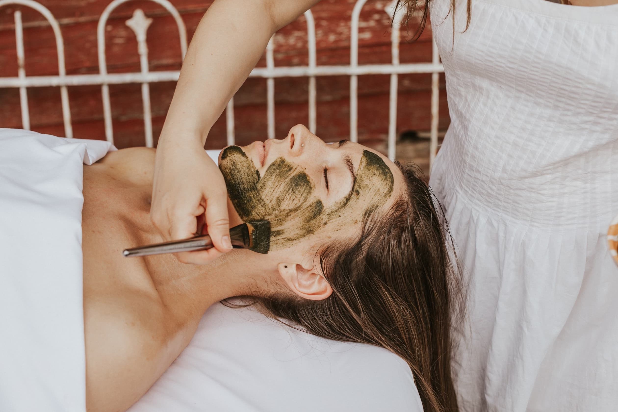 Woman receiving treatment with the Glo2Facial machine